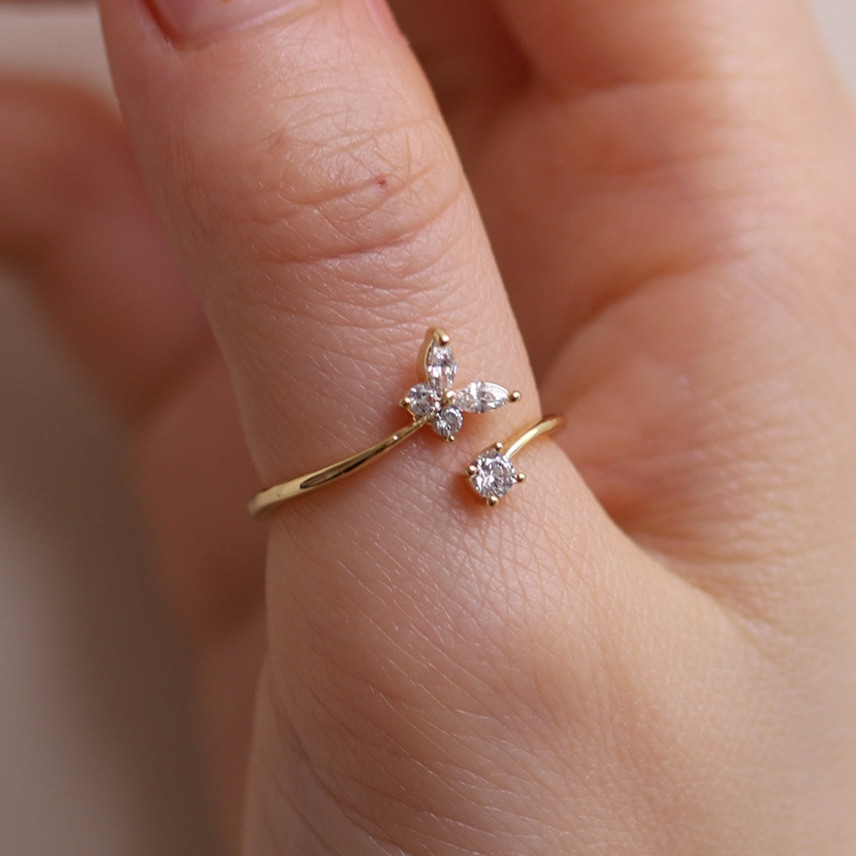 Butterfly cubic ring